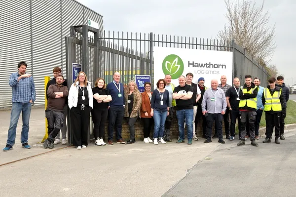 Hawthorn Logistics staff marking 18 years in business outside the Dublin facility